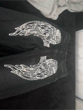 Black Relaxed Men's Jeans with White Wing Print